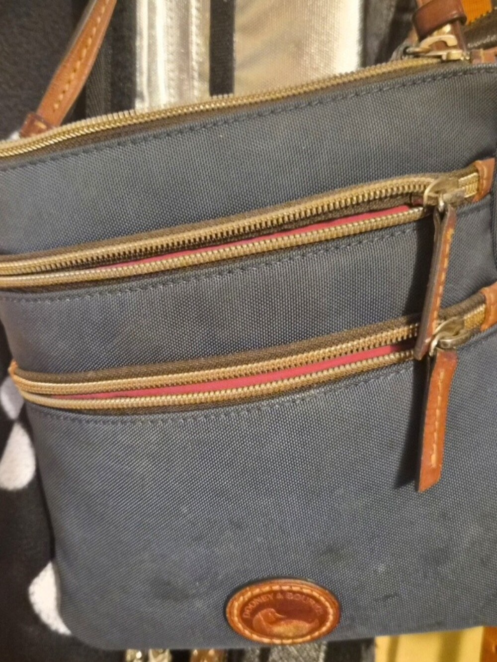 Dooney & Bourke Navy Crossbody with Brown Leather Trim and Red Zipper Accents